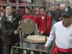 MS Shot of Musicians playing drums, gong and cymbals during parade AUDIO / Vancouver, British Columbia, Canada Stock Footage