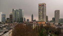 A winter sunrise time lapse of central Frankfurt am Main, Germany, on an exceedingly overcast morning, featuring multiple skyscrapers Stock Footage