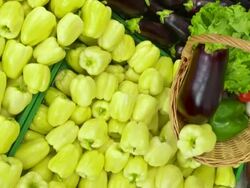 HD CRANE: Woman Picking Up Vegetables In Grocery Store Stock Footage