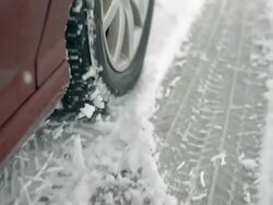 HD Super Slow-Mo: Car Wheel In The Snow Stock Footage