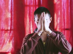 CU Shot of Buddhist Monk in prayer / Jammu and Kashmir, India Stock Footage