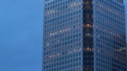 Day to night timelapse of an office, with Office Lights gradually switching off Stock Footage