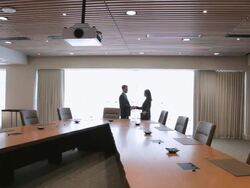  WS Business associates entering empty conference room and discussing documents / Seattle, Washington, United States Stock Footage