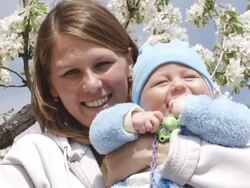 young mother with a baby Stock Footage