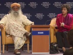 MS ZO Curly hair Lady giving speech in World Economic Forum AUDIO / Davos, Graubunden, Switzerland Stock Footage