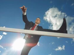 HD Super Slow-Mo: Executive Jumping Over A Hurdle Stock Footage