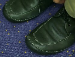 Tying Shoelaces Stock Footage