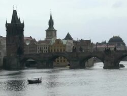 MS One small boat flowing in river near bridge / Prague, Hlavni mesto Praha, Czech Republic Stock Footage