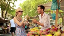 Cute couple dance and drum with papayas in Brazilian marketplace Stock Footage