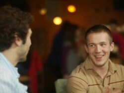 Close up of guys talking at coffee shop Stock Footage