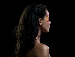 Woman with red and yellow face paint Stock Footage