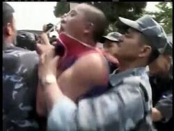 Police in Nepal with Tibetan protestors on Tuesday.  At least three demonstrators, including two Buddhist monks were bloodied during the scuffle. In all, 50 people were arrested News Clip