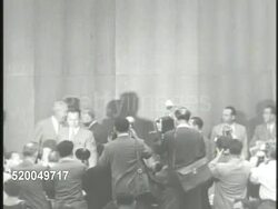 1950: UNITED NATIONS SECURITY COUNCIL: ** VS Soviet Ambassador Yakov Malik (1906-1980) entering council, press taking photographs. VS Council in session, including U.S. Ambassador Warren Austin, Malik speaking w/ hand gestures (no SOT). Instructional Video