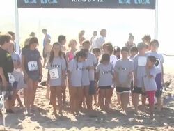 ATMOSPHERE: Kids at Tot Trot start at 26th Annual Nautica Malibu Triathlon Stock Footage