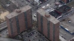 Aerial shot of highrise apartment buildings in Harlem, New York City, USA. Stock Footage