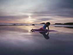 WS POV ZO Woman doing yoga on beach / Bandon, OR, United States  Stock Footage