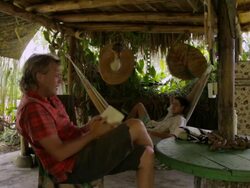 MS Travelers talking relaxing on tropical setting / Boquia, Quindio, Colombia Stock Footage