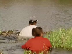 MS PAN ZI Women fishing baits with net / Mato Grosso do Sul, Brazil Stock Footage