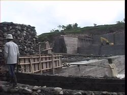 Work on dams and drainage to prevent hot mud flow from volcano News Clip