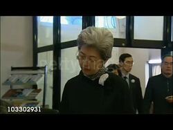 Brown & Cameron sign earthquake condolence book News Clip