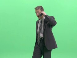 MS, Businessman talking on mobile phone in studio Stock Footage