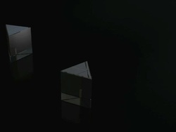 Triangular prisms splitting rays of white light into constituent colours. Stock Footage