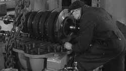 1964 B/W Maintenance workers overhaul rotary compressors in coal mine / United Kingdom Stock Footage
