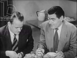 Man at lunch with colleagues. USA, 1953 Stock Footage