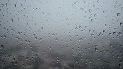 Raindrops flowing on the glass, Real Time Stock Footage