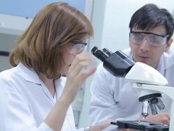 HD : Scientist discussing experiment Stock Footage