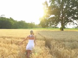 HD SUPER SLOW-MOTION: Joyful Woman Running In Wheat Field Stock Footage