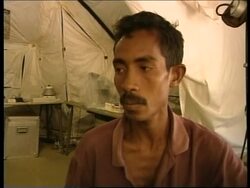 EAST TIMOR: BOY HIT BY FOOD AID BOX UPDATE News Clip