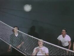 1950s teens hit volleyball/ teens debate Stock Footage
