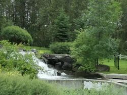 A small waterfall in a park Stock Footage