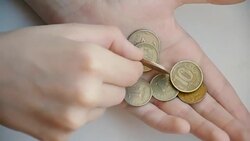 money savings in children's hands Stock Footage