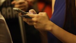 Crowded people in the mass public transportation using their phone Stock Footage