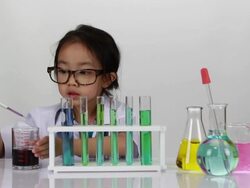 Junior scientist researching at laboratory Stock Footage