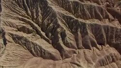 Rugged badlands characterize a California desert. Stock Footage