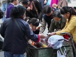 MS Food and shoppers in street market/xian,shaanxi,China Stock Footage