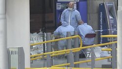 CLEAN : Forensics officers work at Manchesters Victoria Station News Clip