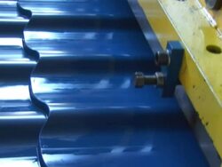 Metal Roof Tile industry - sound included, loopable, NTSC Stock Footage