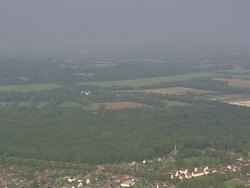 WS AERIAL View of farmland and houses near Lagoon and estuary / Germany Stock Footage