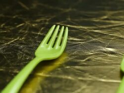 Fork on gold table Stock Footage