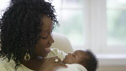 Mother with her newborn baby boy. Stock Footage