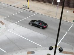 MS Young girl driving modern car filled with balloons and letting them out one at  time / Minneapolis, Minnesota, United States Stock Footage
