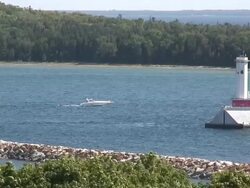 Lighthouse and the boat - HD 1080/60i Stock Footage
