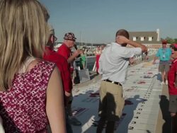 Contestants line up for cherry pit spitting contest Traverse City Stock Footage