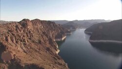 Barren desert mountains surround Lake Powell. Stock Footage