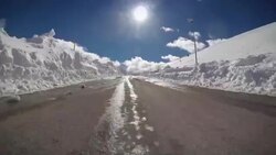 Car Onboard Camera: driving in a snowy road Stock Footage