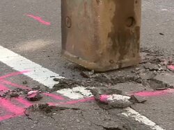 CU Shot of workmen Engraving on street for works at sewage pipe / Saarburg, Rhineland Palatinate, Germany Stock Footage